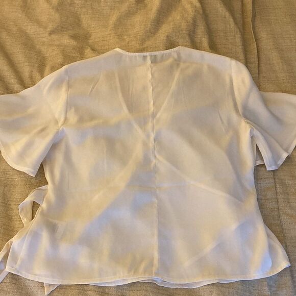 Express Wrap Blouse with Flutter Sleeve and Tie at Left Hip. Size X Small. - Picture 3 of 4